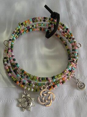 N- Handmade memory wire bracelets set with beads and pendants